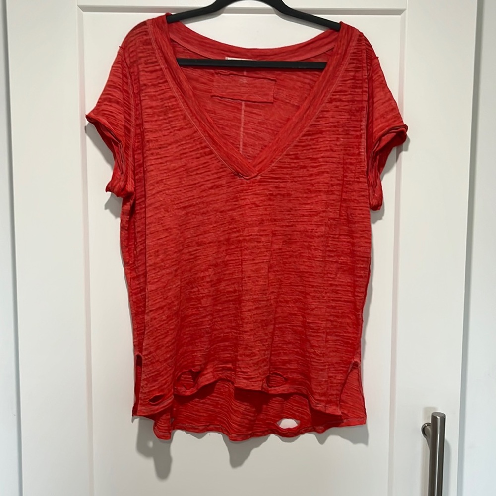 Coral/red oversized v neck tshirt from free people.